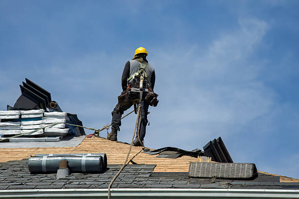 Professional Roofing technician working in West Lebanon, IN